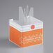 A clear plastic container with a clear lid and a pumpkin spice logo for The Konery Pumpkin Spice Waffle Cone Stand on a bakery counter.
