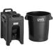 A black plastic CaterGator container with a lid and a black bucket inside.