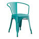 A teal metal Lancaster Table & Seating outdoor arm chair.
