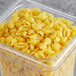 A plastic container with Barilla Medium Shell Pasta.