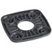 A black plastic square with a hole in the middle and holes around it.