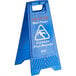 A Lavex blue wet floor sign with white text that says "Caution Wet Floor"