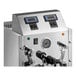 An automatic two-wand milk and beverage steamer with digital controls and a stainless steel exterior.