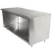 A stainless steel cabinet base work table with a shelf.