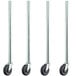 A row of metal poles with black wheels.