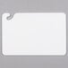 A white plastic San Jamar cutting board with a handle.
