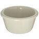 A Carlisle white melamine ramekin with a white rim.