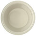 A close-up of a Carlisle white melamine ramekin.
