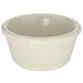 A Carlisle bone white fluted melamine ramekin with a white rim.