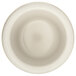 A Carlisle bone white smooth melamine ramekin with a circular center on a white surface.