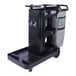 A black Unger RestroomRx housekeeping cart with a black bag on it.