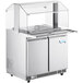 An Avantco stainless steel refrigerated salad bar with a clear cover over trays on a counter.