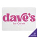A white paper placemat with scalloped edges featuring customizable text in pink.