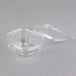 A clear plastic Genpak deli container with a lid.