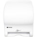 A white San Jamar hands free paper towel dispenser.