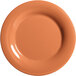 A close-up of a white GET Pumpkin Diamond Harvest melamine plate with a pumpkin design in the center.