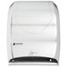 A stainless steel San Jamar hands-free roll towel dispenser.