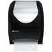 A black and stainless steel San Jamar Tear-N-Dry paper towel dispenser.