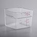 A clear square Carlisle polycarbonate food storage container with red writing.