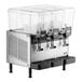 A Vollrath refrigerated beverage dispenser with three clear containers.