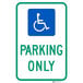 A blue sign with a white wheelchair symbol and text that reads "Handicapped Parking Only" on it.