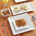 A table set with Acopa Bright White Square and Rectangular dinnerware, including plates, bowls, and utensils.