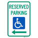 A green and white aluminum parking sign reading "Handicapped Reserved Parking" with a white wheelchair symbol and green arrow pointing to the left.