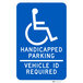 A blue Lavex Texas aluminum parking sign with white text and symbols that says "Handicapped Parking / Vehicle ID Required"