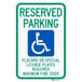 A blue sign with white and green lettering that says "Handicapped Reserved Parking" with a wheelchair symbol.