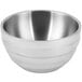 A close-up of a silver Vollrath stainless steel beehive bowl.