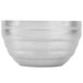 A silver Vollrath stainless steel beehive serving bowl.