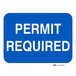 A blue Lavex aluminum sign with white text that says "Permit Required"