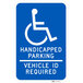 A blue Lavex Minnesota aluminum parking sign with white text reading "Handicapped Parking / Vehicle ID Required" and white wheelchair symbols.