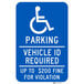 A blue sign with white text reading "Handicapped Parking / Vehicle ID Required / Up To $200 Fine"