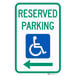 A green and white sign reading "Handicapped Reserved Parking" with a left arrow pointing right.