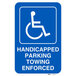 A blue Lavex aluminum sign with a white wheelchair symbol and white text that says "Handicapped Parking / Towing Enforced"