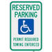 A green and blue aluminum parking lot sign with white text and a white handicap symbol.