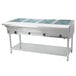 A large stainless steel Eagle Group hot food table with four compartments.