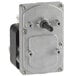 The main drive motor for an Avantco conveyor bun grill toaster, a small metal device with a black and silver metal knob.