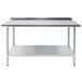 A stainless steel Advance Tabco work table with a galvanized undershelf.