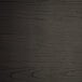 A black wood Lancaster Table & Seating counter height stool seat with a grainy pattern.