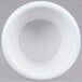 A close-up of a white Thunder Group smooth melamine ramekin.