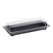 A rectangular black plastic sushi container with a clear fitted lid.