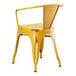 A Lancaster Table & Seating yellow metal outdoor arm chair with a backrest.