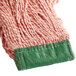 A red Rubbermaid wet mop with a green headband.