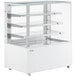 An Avantco white display case with glass shelves.