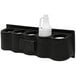 A black plastic container with a white bottle in it and a white jug with a black plastic container on it.