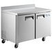 An Avantco stainless steel worktop refrigerator on wheels.