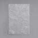 A white paper bag on a white background.