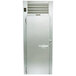 A Traulsen Correctional Roll In Refrigerator silver door with a vent.